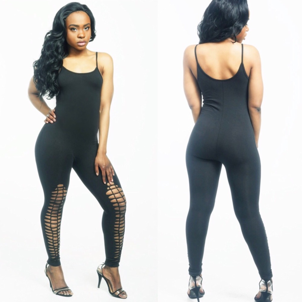 Jumpsuit w/ lace up leg detail.